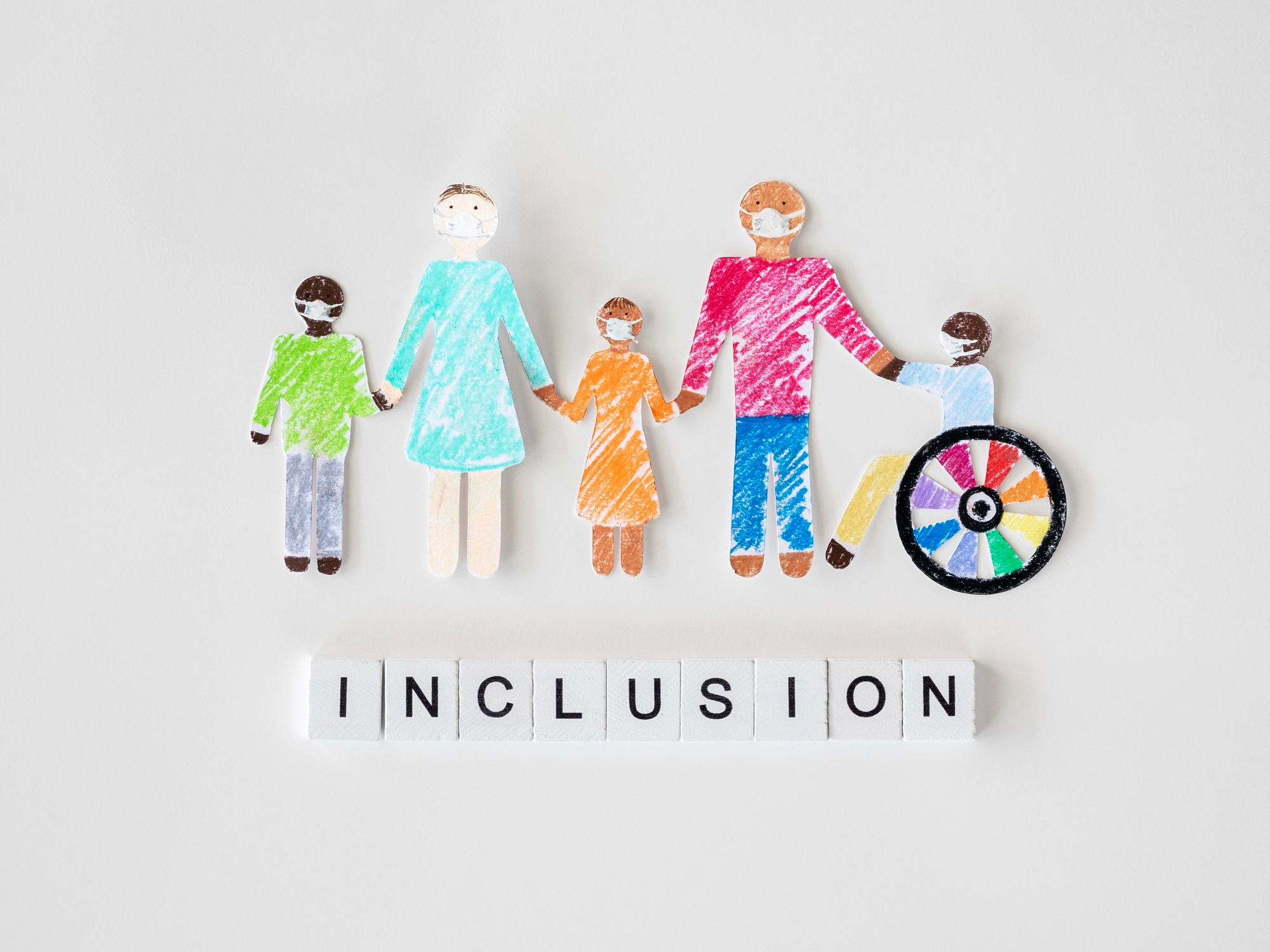 familia-discapacidad-persona-concepto-inclusion-papel-recortado